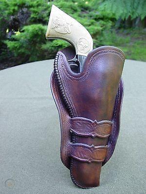 wild-bill-cleaver-holster-1-colt-saa_1_41ba3b46cd9b2ef855b403bbdadfe2fd (1).jpg