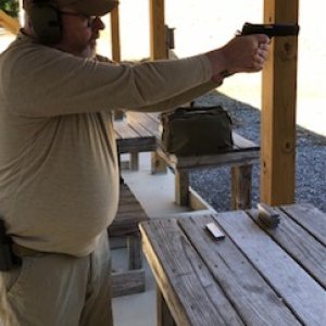 Fat Guy Shooting SR1911 10MM.jpg